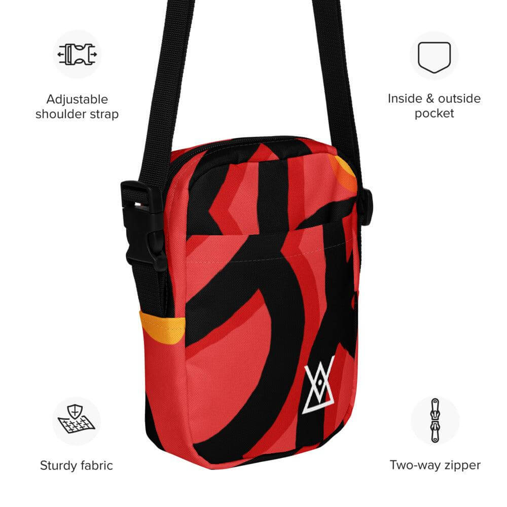 Hora Magica Utility Crossbody Bag with adjustable strap, two-way zipper, sturdy fabric, and inside & outside pockets in vibrant red & black design